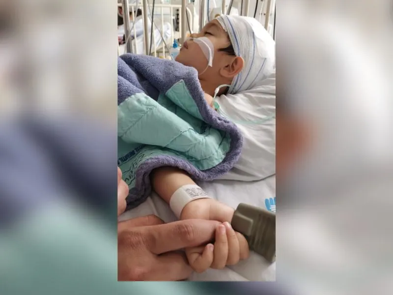 Menino com tumor no cérebro precisa de ajuda para tratamento